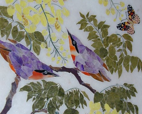 Explore an image featuring birds meticulously crafted from intricate inlay marble art